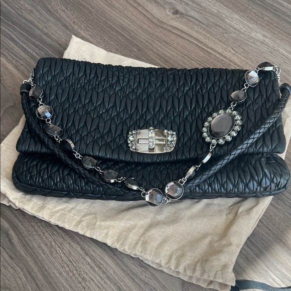Miu Miu Handbags - Authentic Miu Miu Black Textured Clutch with Jewel Chain